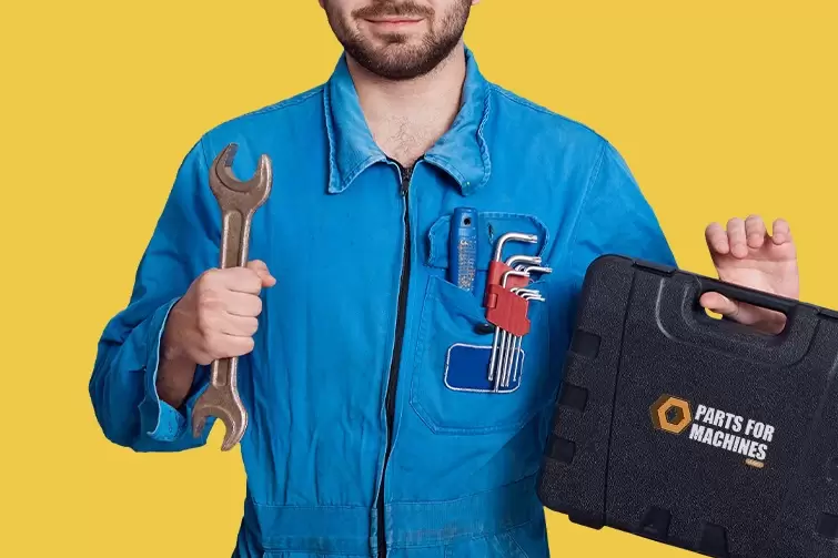 A man holding a wrench and toolbox is working on a project at home.