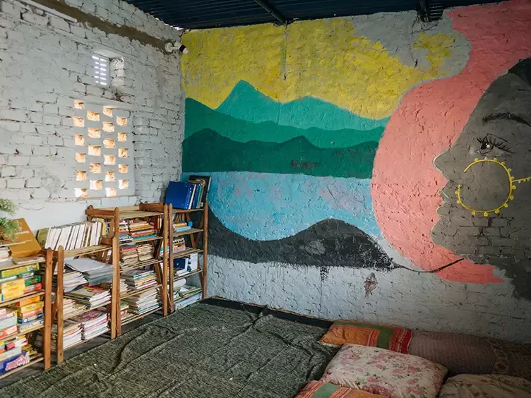 A TAF Global room with a mural on the wall.